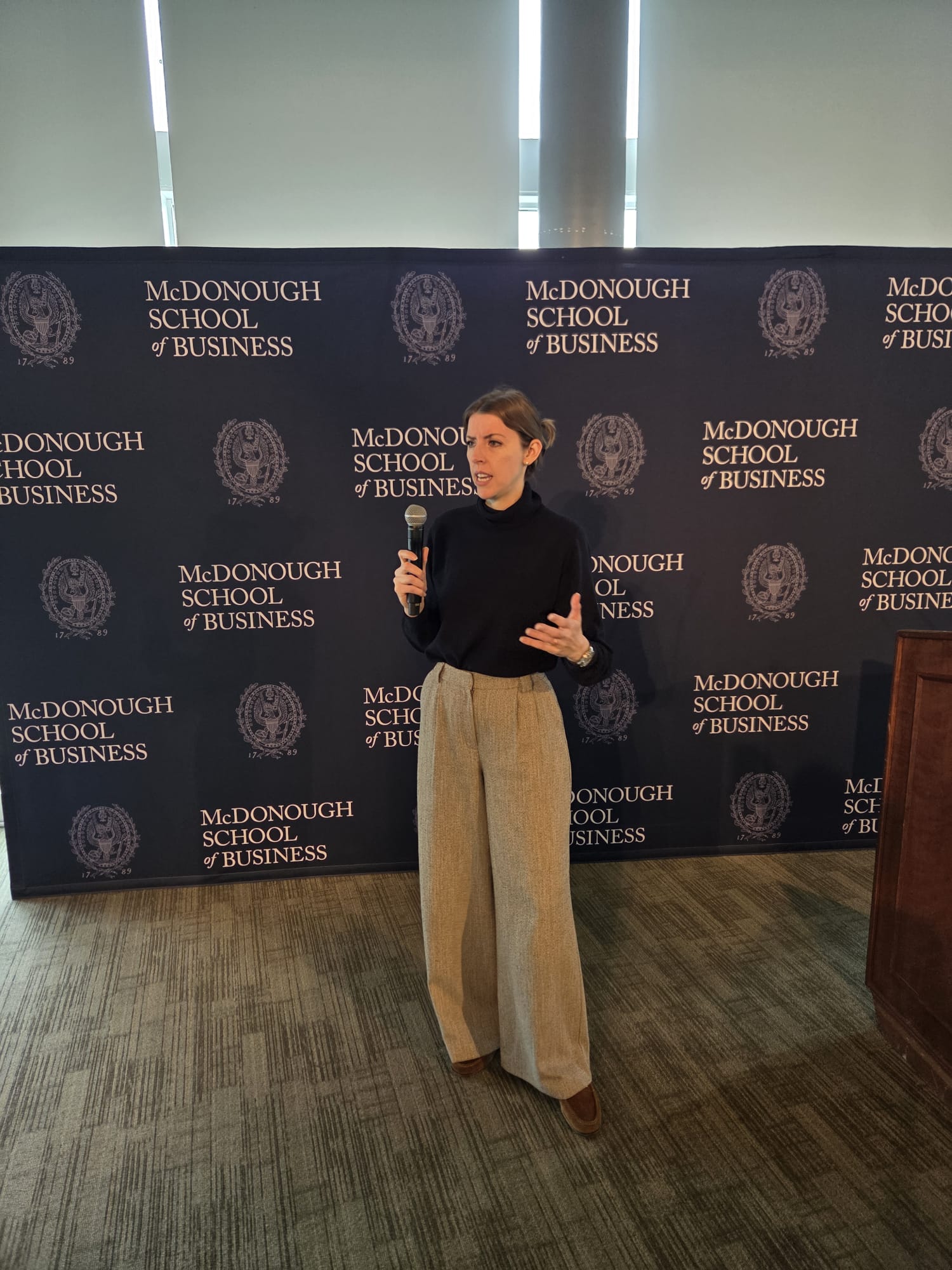 Adriana Puram speaking at Georgetown University McDonough School of Business